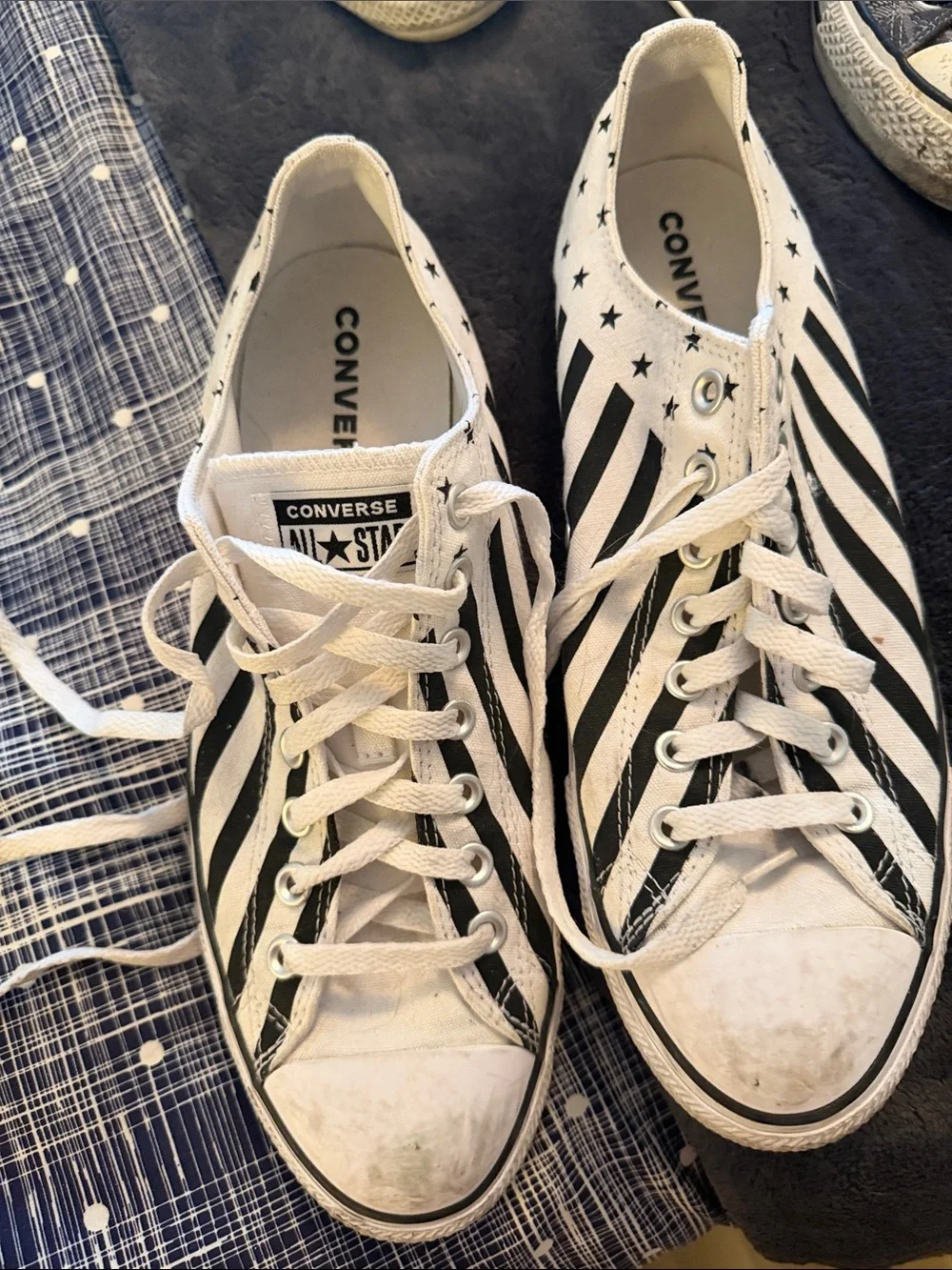 Converse White Canvas Sneakers with Black Diagonal Stripes and Star Accents